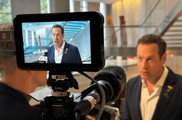 On camera interview at a defense tech event